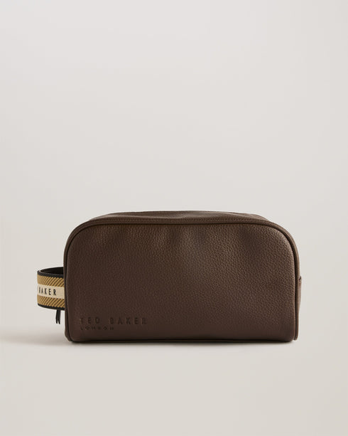 KAIIRO-Gifts-Your Toiletries Can Travel In Style Too. With Its Sleek Design And Smooth Leather Kaiiro Is A First-class Ticket For Your Personal Items. The Zip Fastening Keeps Everything Secure While The Spacious Interior Offers Plenty Of Room For Your Essentials. Washbag Faux leather Branded webbing handle Zip fastening Debossed logo Dimensions: 13cm x 25cm x 11cm- Ted Baker Romania